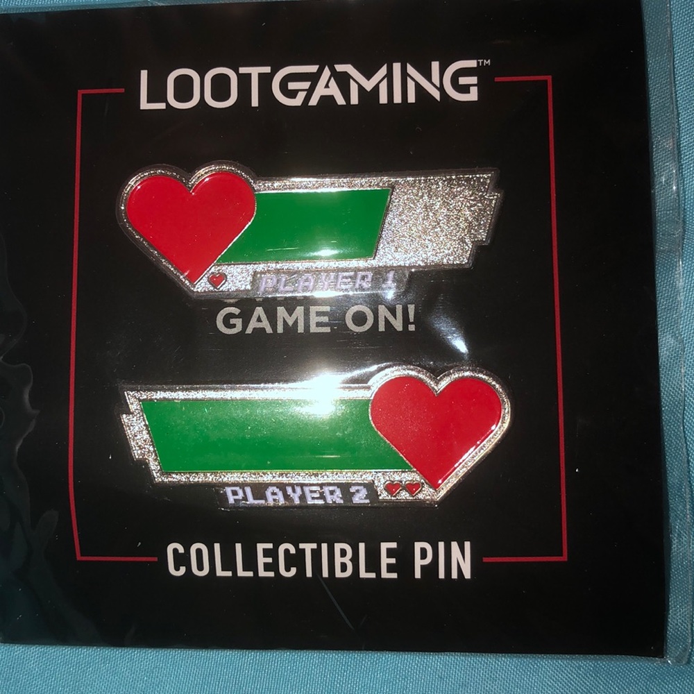 Never opened glow-in-the-dark collector's pins